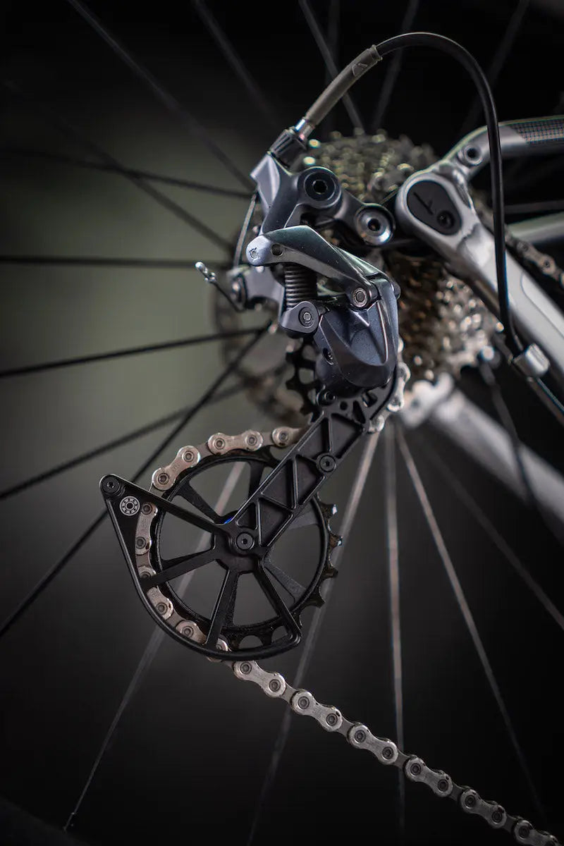Oversized derailleur cages for gravel bikes
